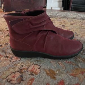 Burgundy Cloudstepper zip-up ankle booties with pleated detailing. Worn once.